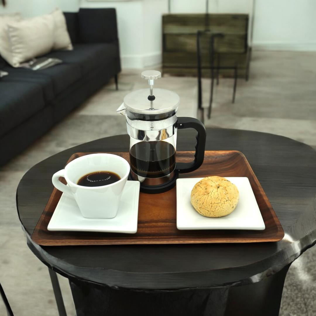 Wood serving tray with coffee and pastry